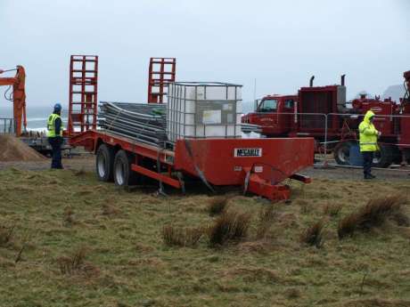 machinery parked on unprotected green area