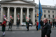 Protestors with flags raised as Bob Doyle march approaches