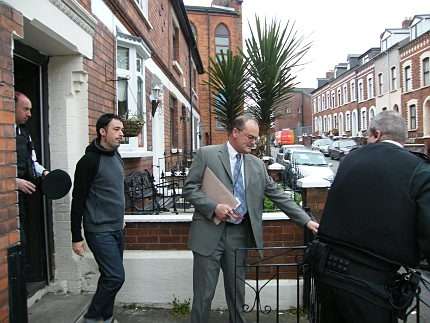 Benat being arrested at his home