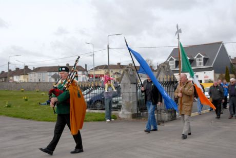 Pat Hurley of Cork Volunteers Pipe Band leading procession