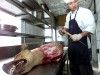 A greyhound carcass in a butcher shop in China