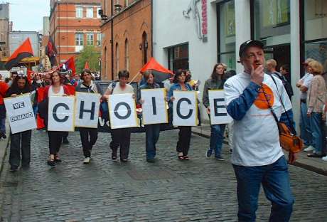 Alan (right) leading a small pro-choice march in 2002