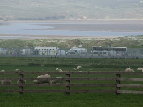 Garda vehicles etc. inside Shell's compound