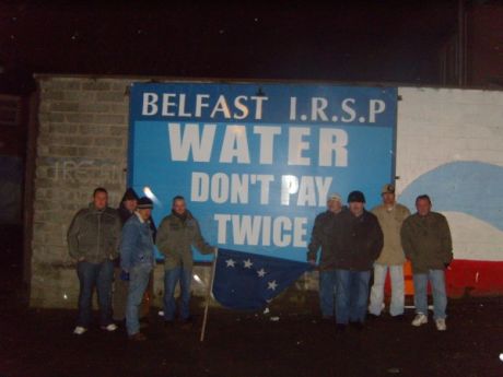 IRSP comrades with erected billboard