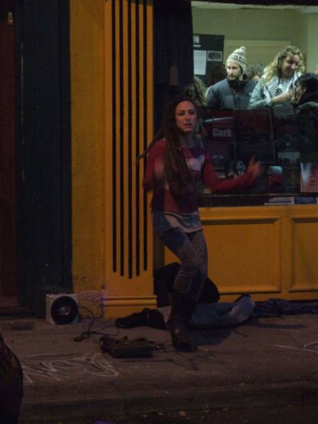 An unscheduled street performance outside Solidarity Books, evening. Bravo, Kate!