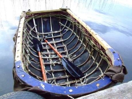 Stuart McIntyre�s coracle, still under construction, hit�s the water with confidence.