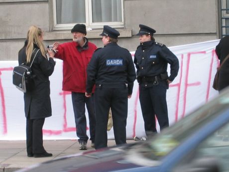 One of the assorted drunks trying to pull down the banner