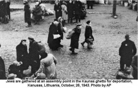 Jews are gathered at an assembly point in the Kaunus Ghetto for deportation, Kaunus Lithuania, October 26, 1943.