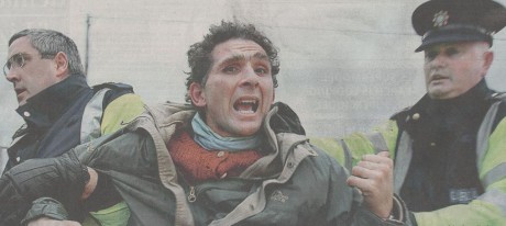 Click on image to see full-sized version This protesting gardening enthusiast received a thumping at the hands of gardai - he was probably sowing the seeds of discontent !