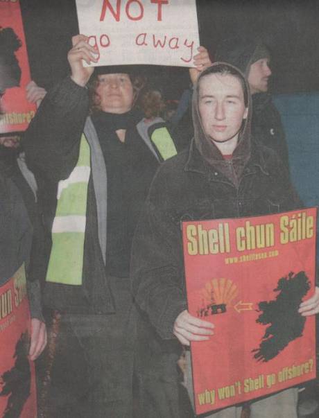 Click on image to see full-sized version A mean-looking subversive wields a dangerous poster in an obviously threatening manner