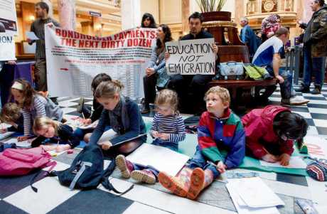 Occupy Cork protest holds maths class in bank 