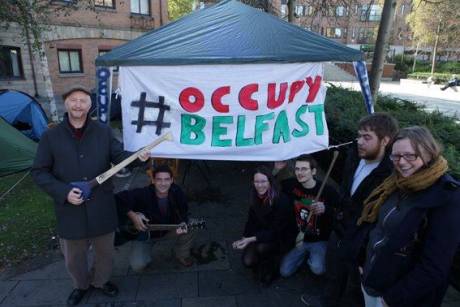 Billy Bragg with #OccupyBelfast, complete with hurl