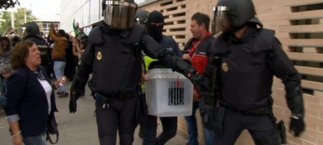 Spanish police take ballot papers by force and of course the votes cast within this morning - 