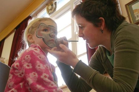 Face-painting during a children's activities day at Nicholas of Myra in February 2006