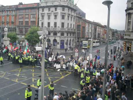 A section of the crowd lining O'Connell Street and Abbey Street